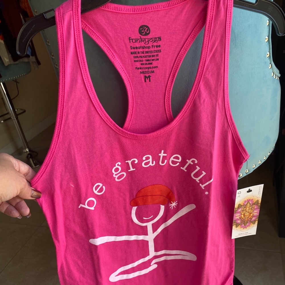 Brand new Funky Yoga, hot pink racer back tank top with tags. 100% cotton. Sz M